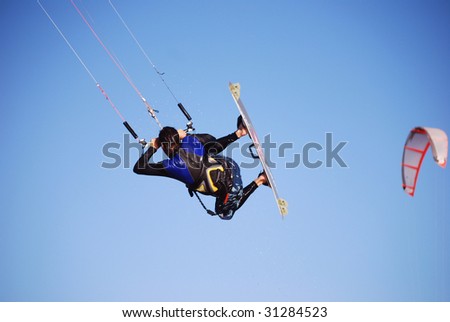 Similar – Image, Stock Photo Cool Move Kiting Ocean