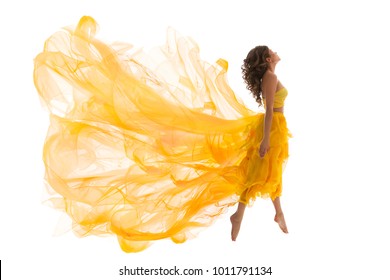 Flying Woman Levitation Jump, Fashion Model in Fly Yellow Fluttering Dress, Young Dancing Girl White Isolated