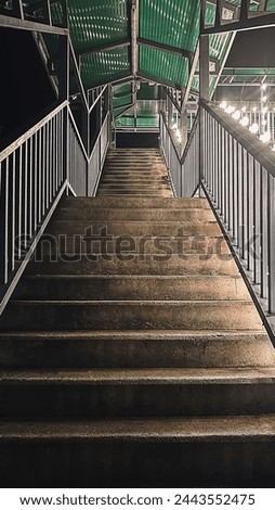 Flyover stairs, Stairways of a pedestrian flyover, ladder of the overpass, stairs in dark and the light on the side

