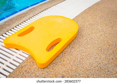 Foam board for the teaching of swimming beside swimming pool