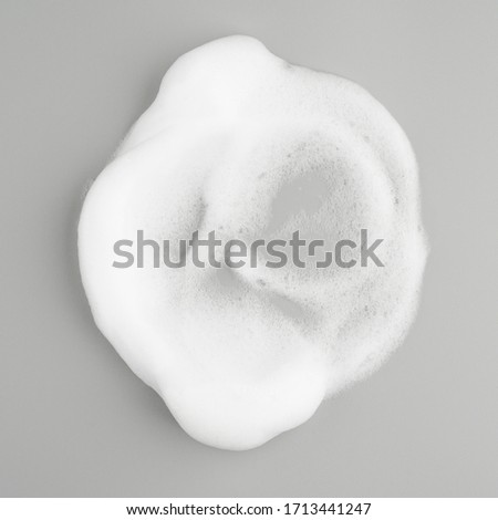 Foam bubble on gray background on top view object beatuy health care concept design