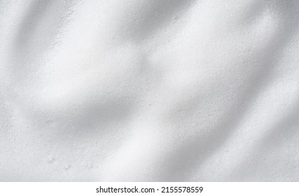 Foam bubble from soap or shampoo washing on top view.Skincare cleanser foam texture. - Shutterstock ID 2155578559