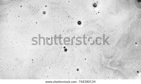 Foam bubble from soap
or shampoo. Washing and cleaning, suds background, overlay texture.
Top view, close up