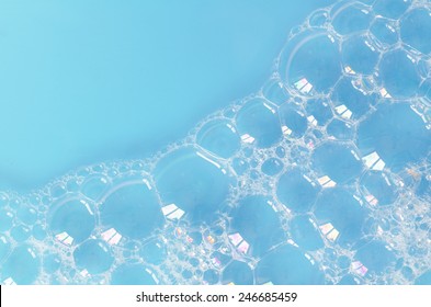 Foam Bubbles On Blue Water Background