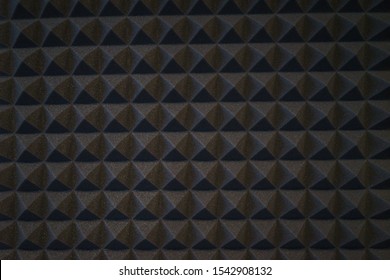 Foam Material Specifically For The Walls Of A Recording Studio. Soundproof And Sound Absorbing Materials. Details, Close-up Of Triangles Wall Decoration. Soft Focus And Shallow Depth Of Field.