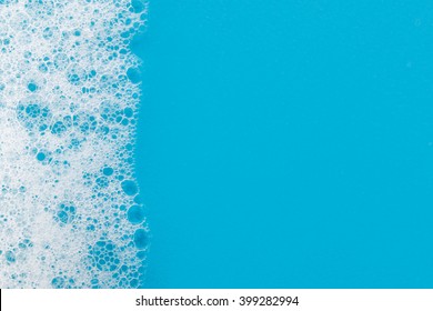 foam on blue background macro