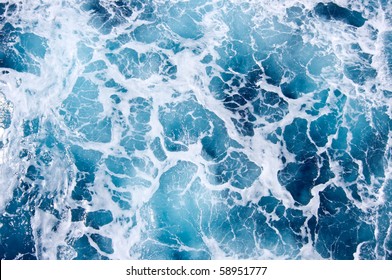 foam on the blue sea