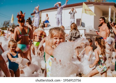 Foam party on summer beach. People dancing and having fun on the hotel. Anapa city. Russia. 1 of august 2020.