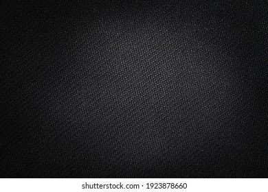 Foam rubber texture. Black background. Dark polystyrene.