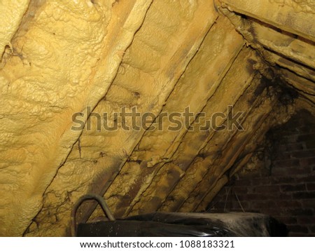 Foam sprayed insulation inside a loft