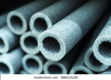 Foamed polyethylene insulation material for sanitary pipes. Trade in building materials in a store. Close-up