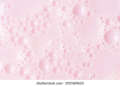 Foamed Surface Of Pink Liquid Soap, Small Bubbles, Closeup