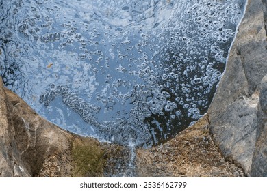 Foamy Water Surface on Rocky Stream - Powered by Shutterstock