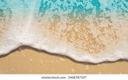 foamy wave on sand, close up