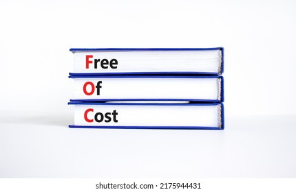 FOC Free Of Cost Symbol. Concept Words FOC Free Of Cost On Books On A Beautiful White Background. Business And FOC Free Of Cost Concept. Copy Space.