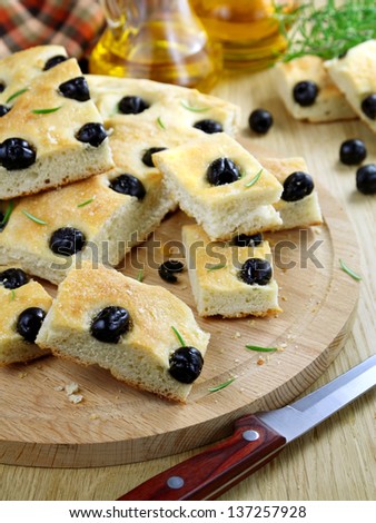 Similar – Focaccia bread with knife and olive oil