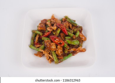 Focal Focus Of Thai Dish Stir Fried Pork Belly With Red Curry Paste And Sting Beans, Tasty And Spicy Famous Icon. Meat Can Be Seafood, Pork, Chicken, Beef Depends On The Order And Favor