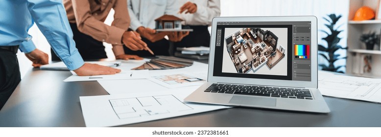 Focus laptop laptop screen display architecture software for building blueprint design with blurred background of interior and architect discussing in the office. Insight - Powered by Shutterstock