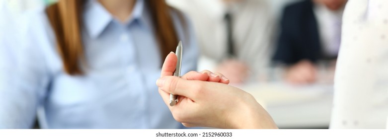 Focus On Beautiful Woman Arm Holding Writing Pen.