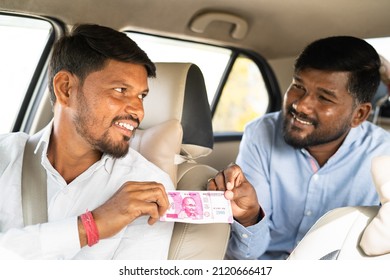 Focus On Cab Driver Passenger Or Businessman Paying Money To Cab Driver For Trip - Concept Of Destination, Successful Journey And Self Employment