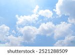 Focus on clouds. The sky was bright blue with pure white clouds like soft cotton.Full frame shot. Heaven sky bright Blue sky background