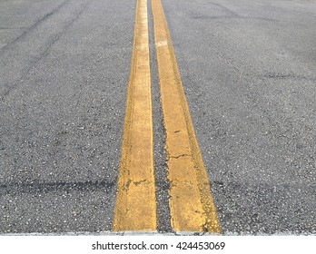 focus on double yellow lined road 