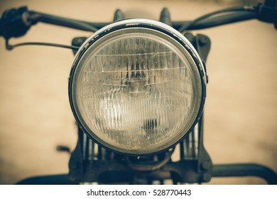 Focus On A Headlamp. Retro Motorcycle With Headlight