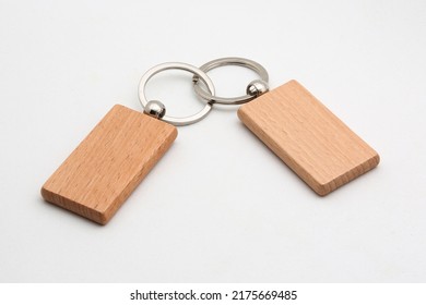 Focus on the keychain wood with a white background.