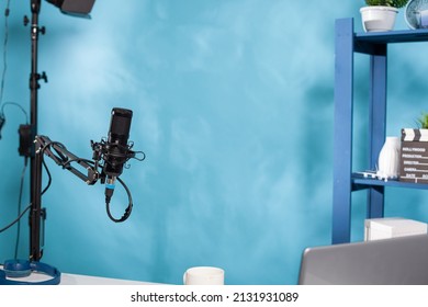 Focus On Professional Microphone Swivel Boom Arm Stand In Empty Podcast Transmission Studio Used For Online Radio Station Streaming. Detail Of Audio Live Broadcast Desk Setup With Digital Mic.