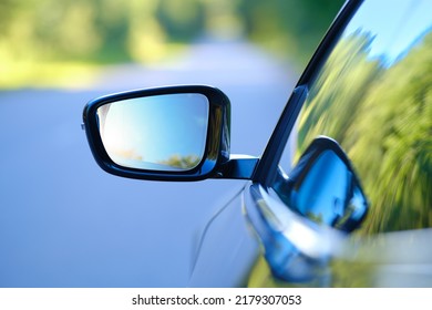 Focus on rear view mirror of modern car
