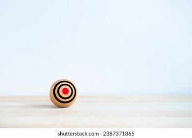 Focus on small target groups, business goal concepts. Target dart icon on wooden sphere ball without arrow on red spot, bullseye dartboard, isolated on white background with copy space, minimal style.