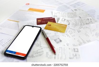 Focus On Smart Phone With Icon Bar On Screen With Credit Card And Bank Statement, Many Bill And  From Buying Via Credit Card, Online Shopping Concept