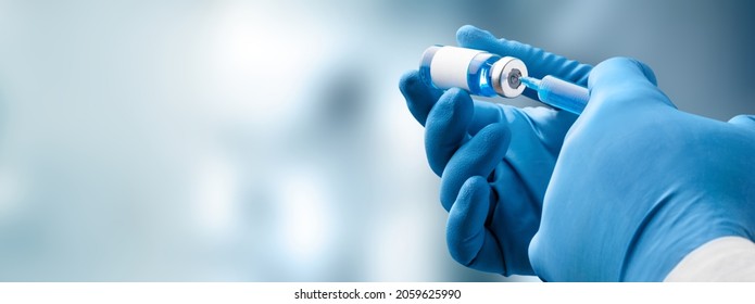 Focus on vaccine, doctor or nurse hands taking covid vaccination booster shot