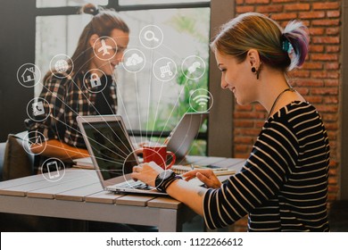 Focus On Woman Use Computer Laptop With IOT, Internet Of Things Conceptual Sign, Internet Era, Internet In Every Day Lifes In Cafe