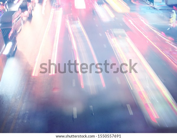 ฺBlurred\
focus of speed light line from the car at\
night