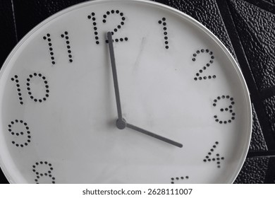 Focus time in clock of four o'clock for design in your business concept isolated on black background