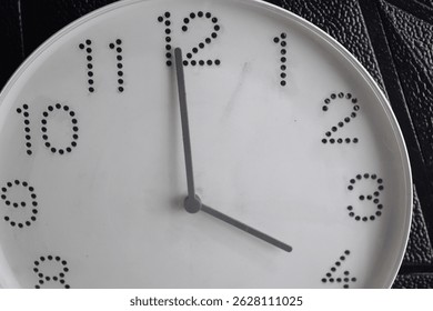 Focus time in clock of four o'clock for design in your business concept isolated on black background