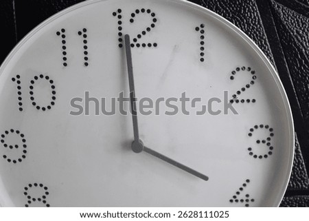 Focus time in clock of four o'clock for design in your business concept isolated on black background