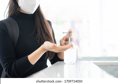 Focus At Woman Hand Washing Alcohol Gel In Hotel Front Desk, Protection Policy For Stop Break Out Corona Virus Or Covid 19 Spread