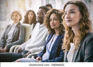 Focused Business People During Meeting In Office