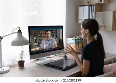 Focused Engaged Intern, Student Talking To Coach, Teacher, Making Video Call, Using Desktop Computer With Big Monitor. Freelance Employee, Designer Discussing Project With Client, Customer