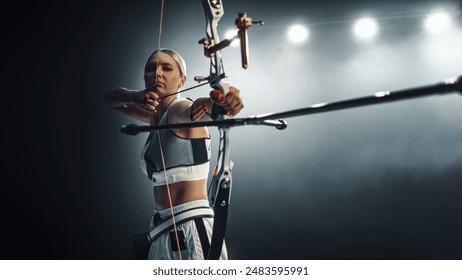 Focused Female Archer Aiming Her Bow in Dramatic, Dimly Lit Setting, Precision and Determination in Competitive Archery. Championship of Cinematic Athletic Excellence - Powered by Shutterstock