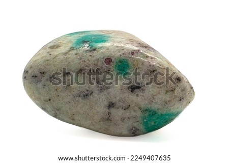 Focused Green K2 Jasper tumbled crystal, K2 granite, tumbled stone green azurite - malachite on white granite macro photography isolated on a white surface background 