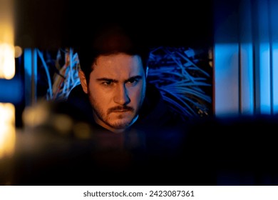 focused hacker data center hacking software system vulnerable cyber security server room technology digital world metaverse