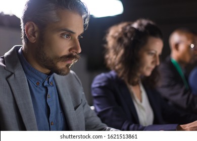 Focused handsome businessman looking at laptop. Serious bearded man working in office. Business, working late concept - Shutterstock ID 1621513861