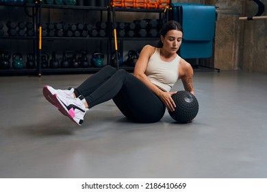 Focused Motivated Strong Woman Working Out In Gym, Having Determined Look