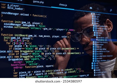 Focused Programmer Analyzing Code on Computer Screen - Powered by Shutterstock