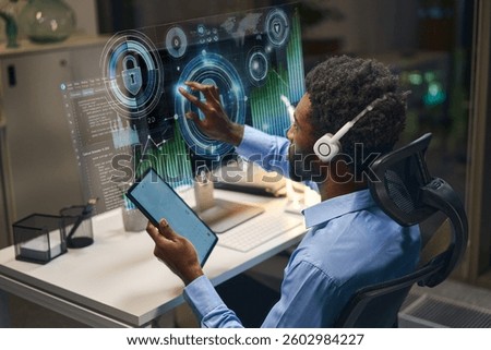 Focused Programmer Utilizing Advanced Holographic Technology For Innovative Cybersecurity Development And Analysis