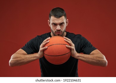 Focused seriously male in black shirt looking and posing at the photo camera - Powered by Shutterstock