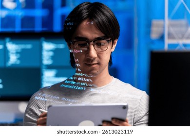 A focused software engineer reviews code tablet modern workspace, surrounded by screens displaying programming scripts, embodying essence of coding and development coding developer software engineer
